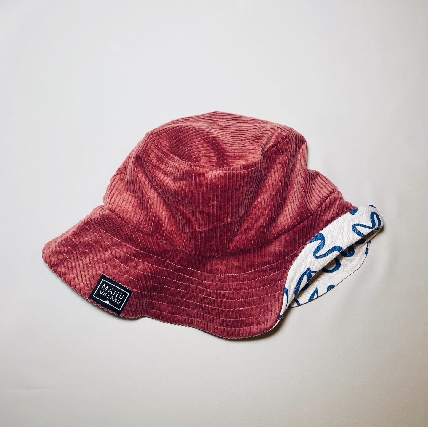 White Floral & Ash Rose Corduroy Reversible Bucket Hat